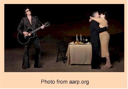 Thriving-Baby-Boomers - Touch - Couple hugging & kissing while a man plays guitar