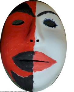Thriving-Baby-Boomers - Comradery - Half 'devil,' half 'angel' mask (Painted by Linda Wall, 2015)