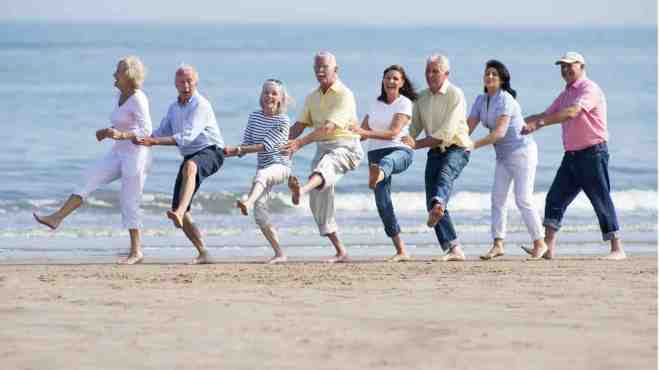 Thriving-Baby-Boomers - Social Activities - Seniors at the Beach